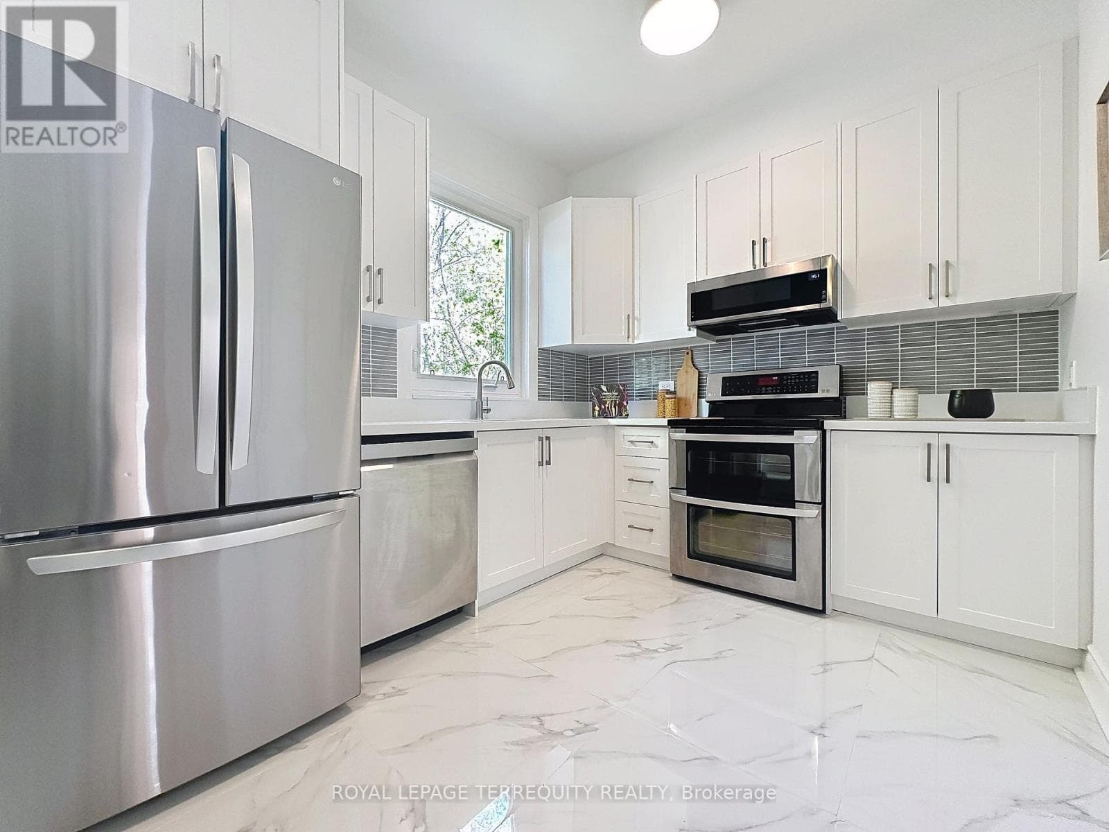 Danforth corner-lot detached with separate-entrance suite potential at $880,000 10
