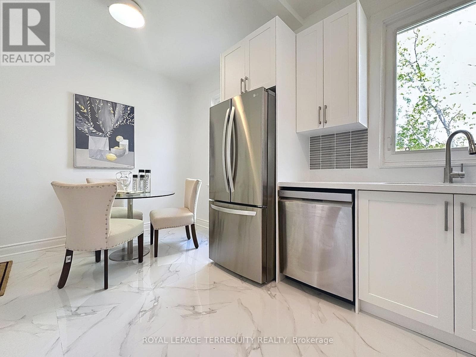 Danforth corner-lot detached with separate-entrance suite potential at $880,000 11