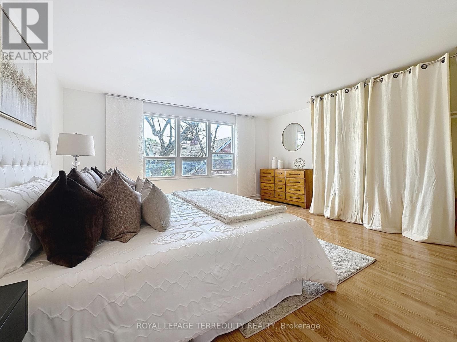 Danforth corner-lot detached with separate-entrance suite potential at $880,000 13