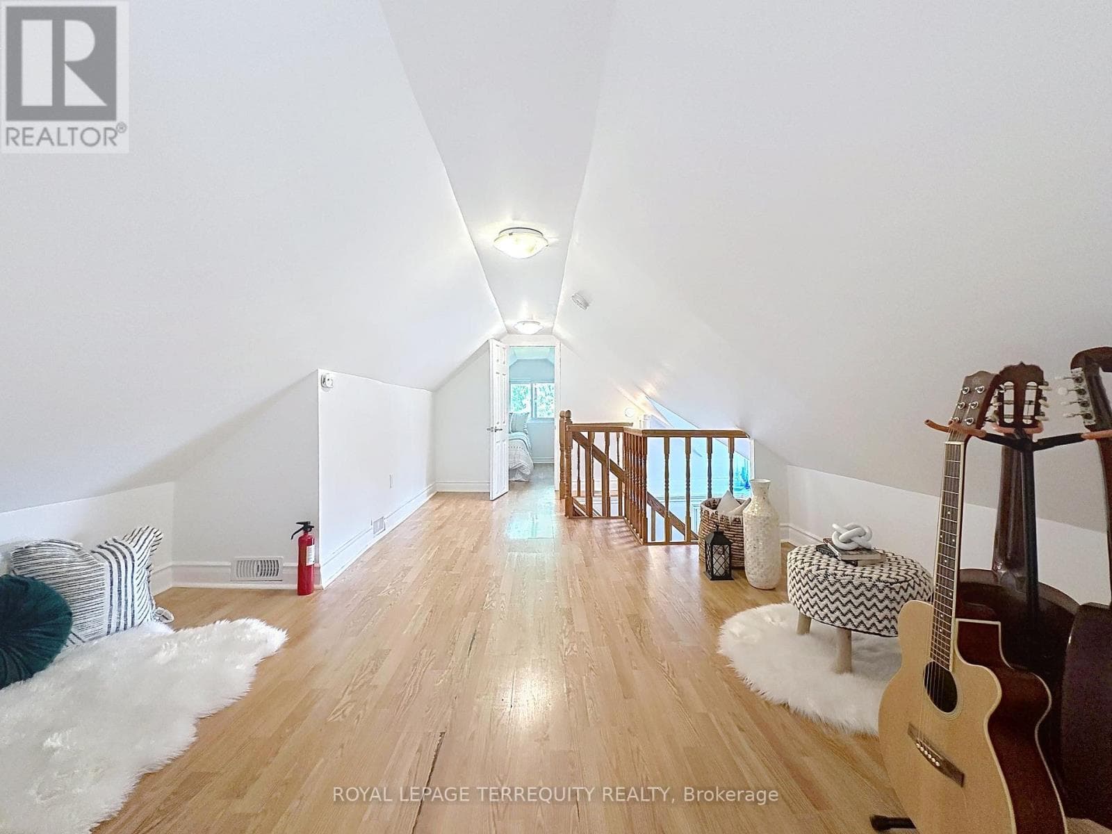 Danforth corner-lot detached with separate-entrance suite potential at $880,000 18