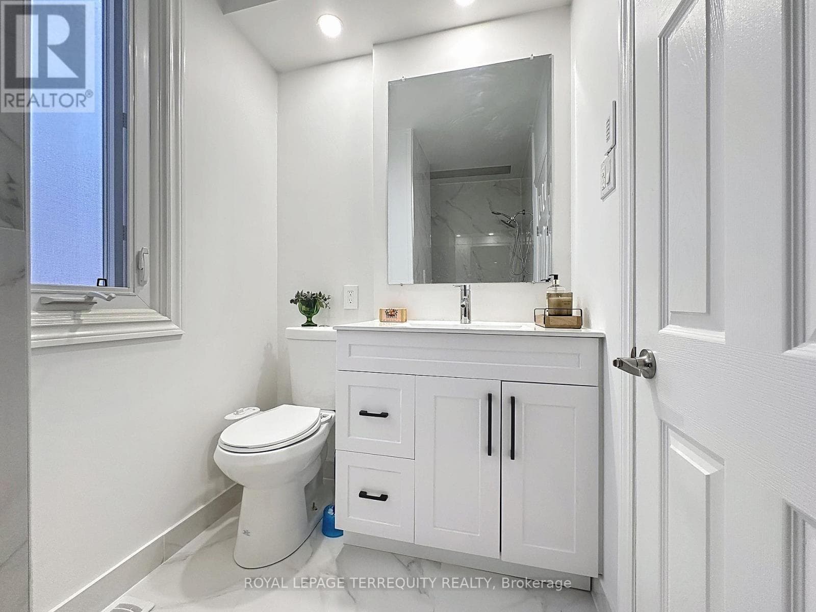 Danforth corner-lot detached with separate-entrance suite potential at $880,000 21