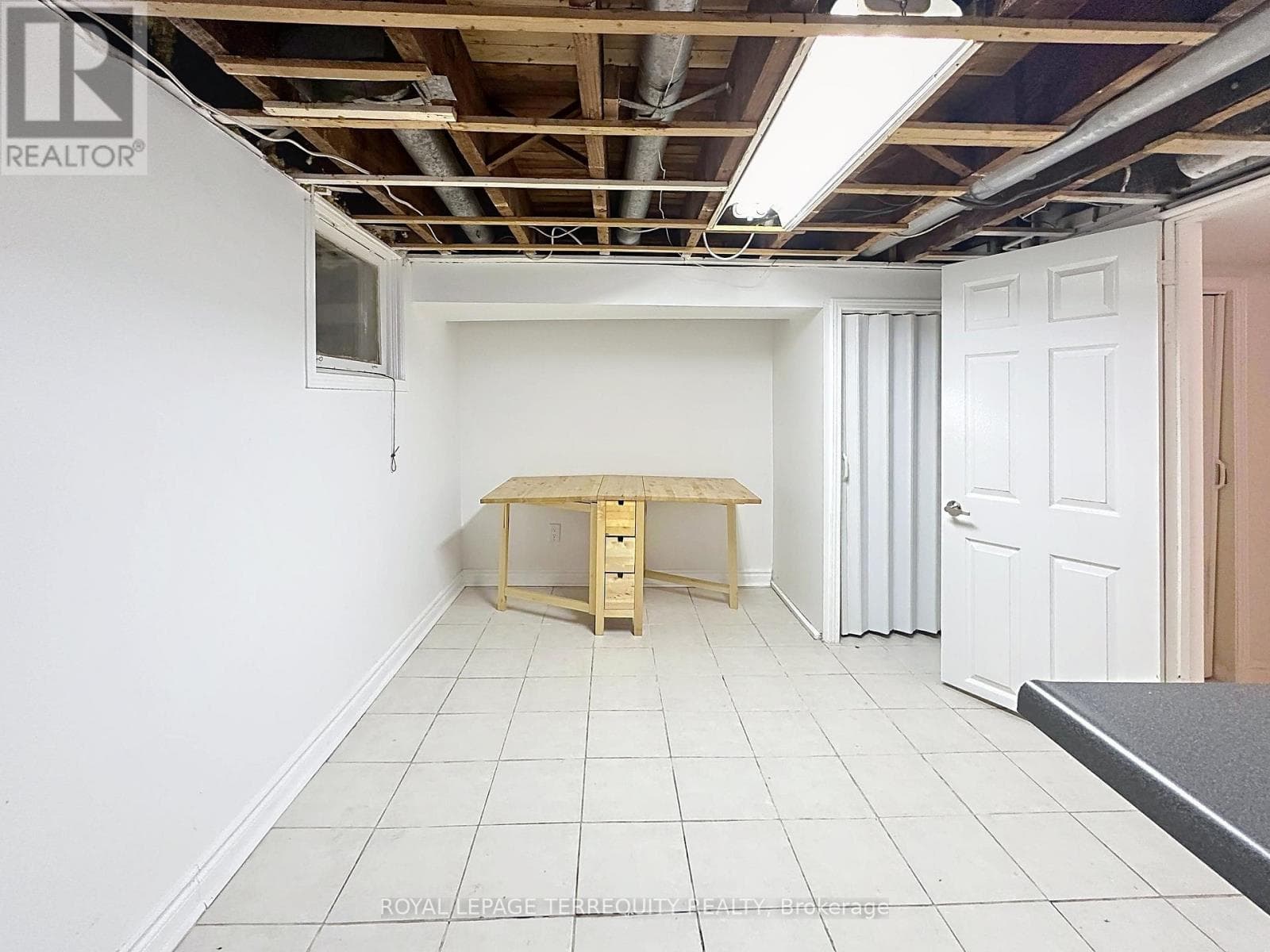 Danforth corner-lot detached with separate-entrance suite potential at $880,000 23