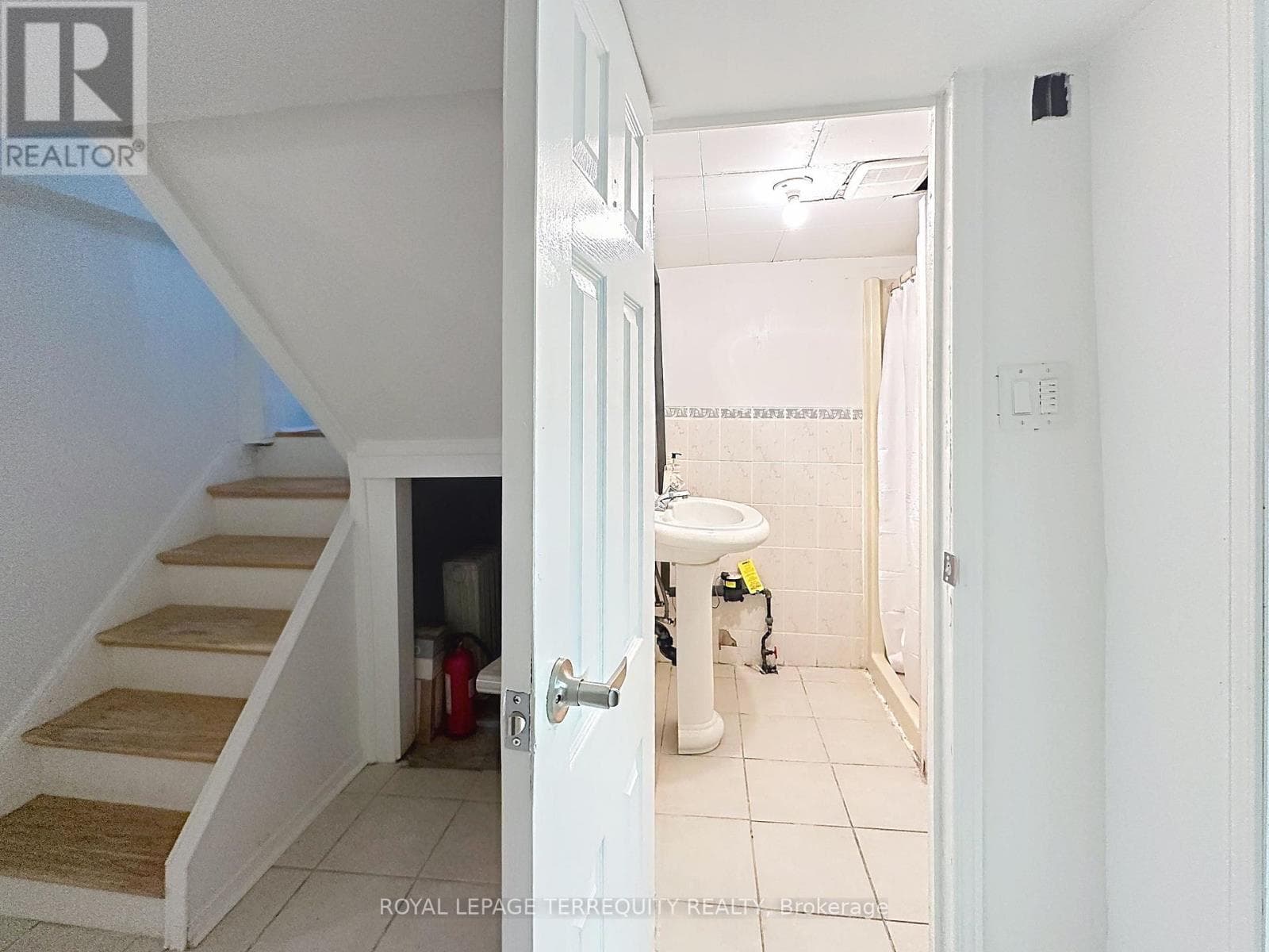 Danforth corner-lot detached with separate-entrance suite potential at $880,000 26