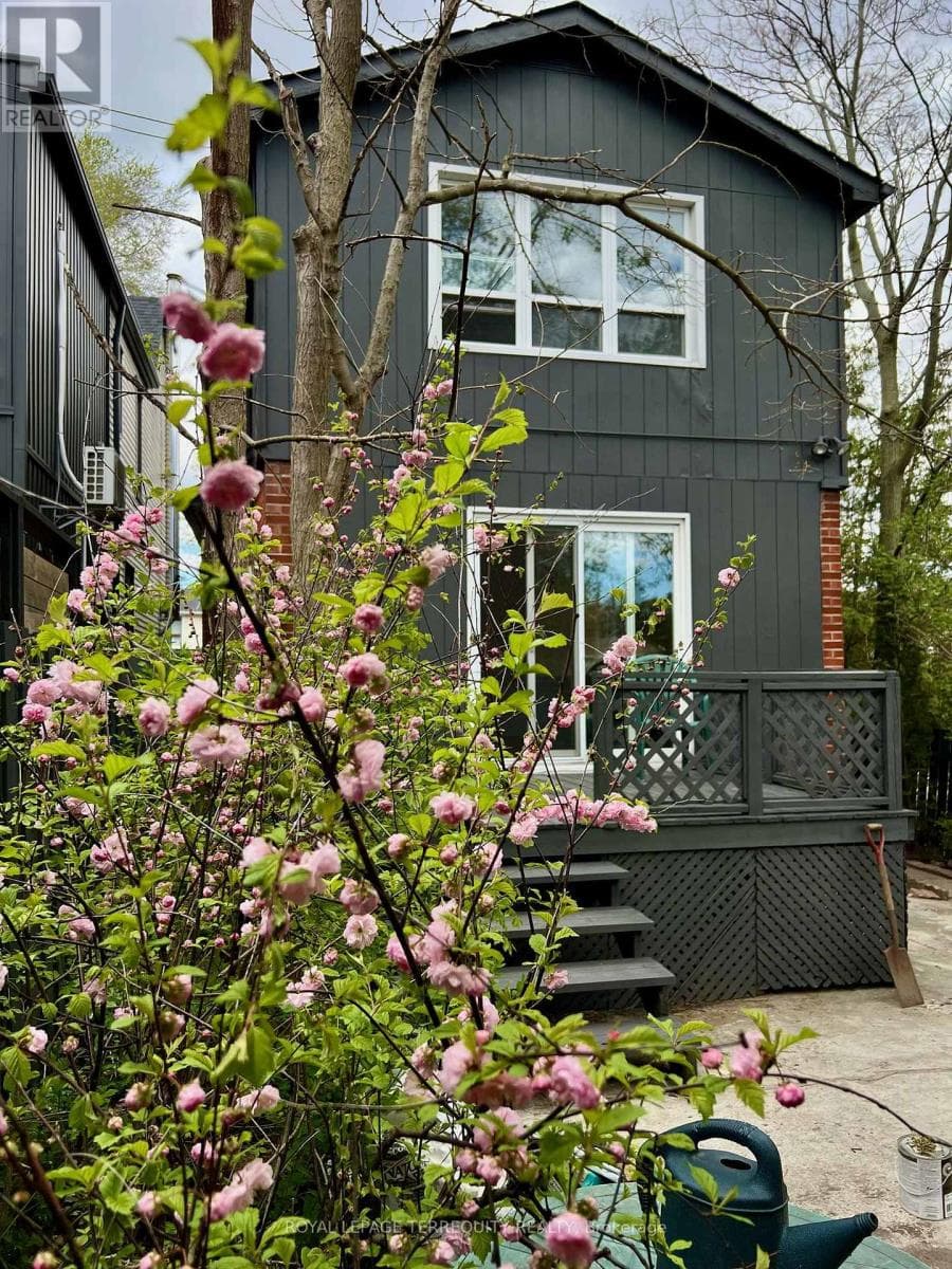 Danforth corner-lot detached with separate-entrance suite potential at $880,000 27