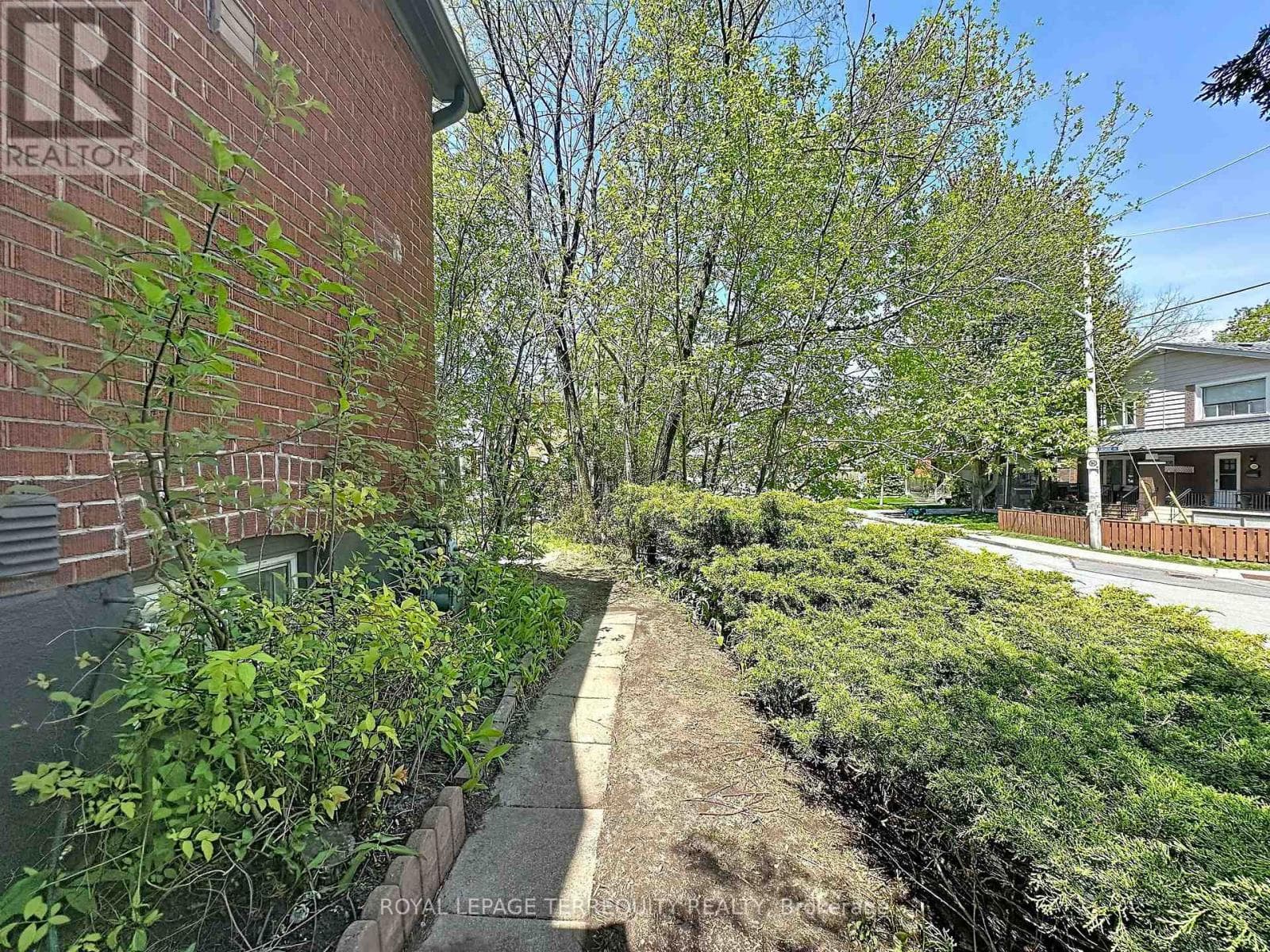 Danforth corner-lot detached with separate-entrance suite potential at $880,000 28