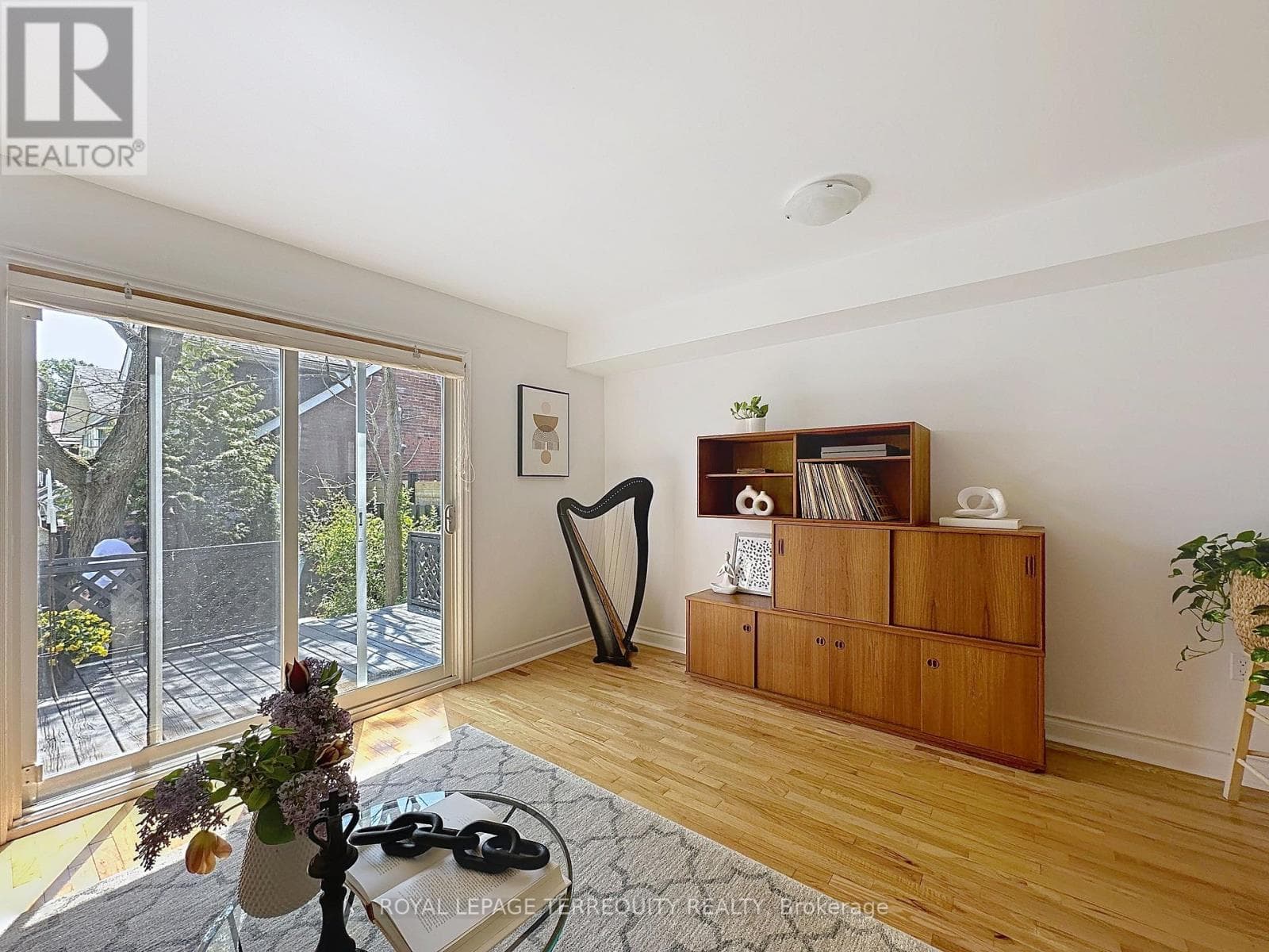 Danforth corner-lot detached with separate-entrance suite potential at $880,000 3