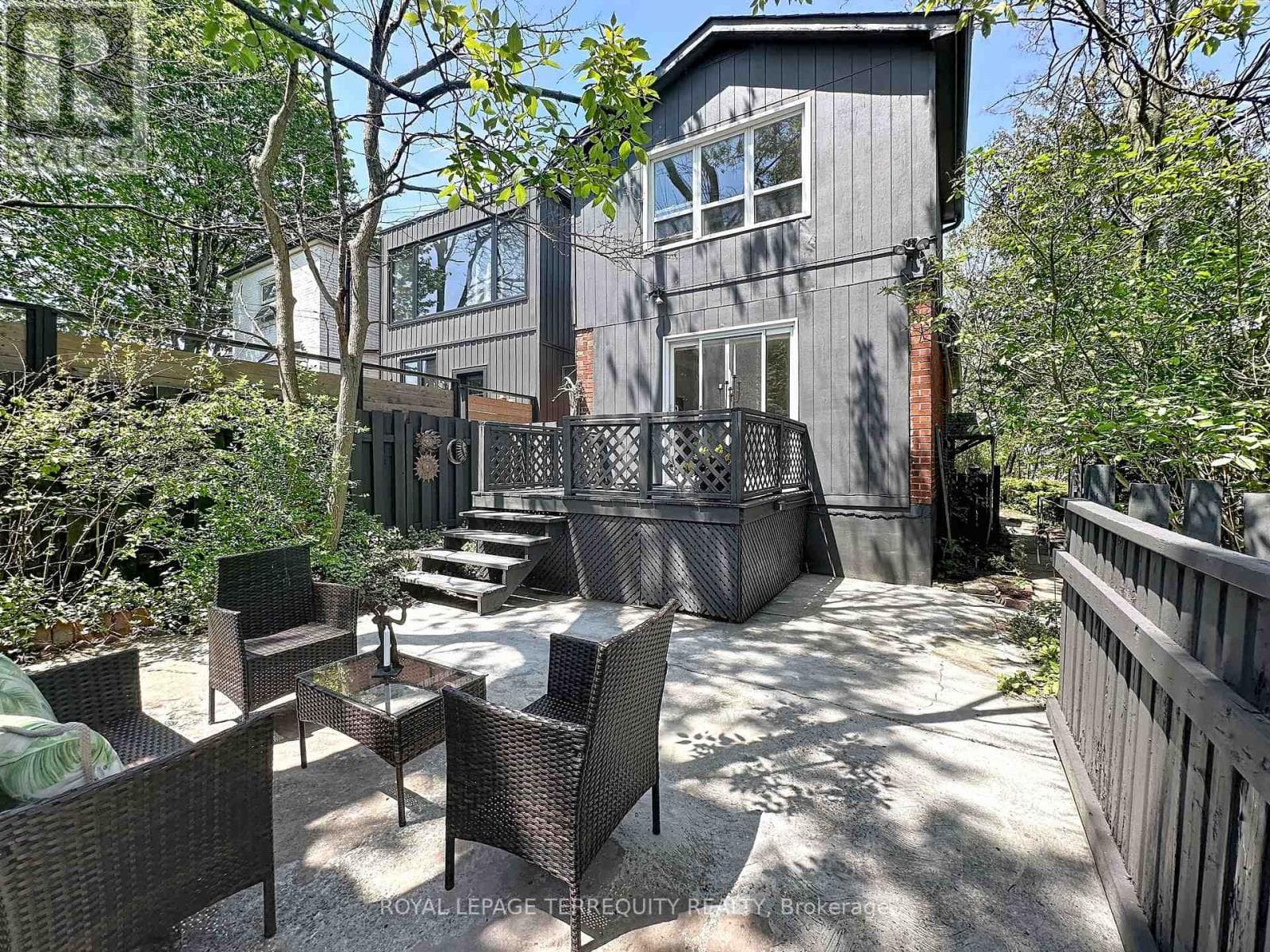Danforth corner-lot detached with separate-entrance suite potential at $880,000 30