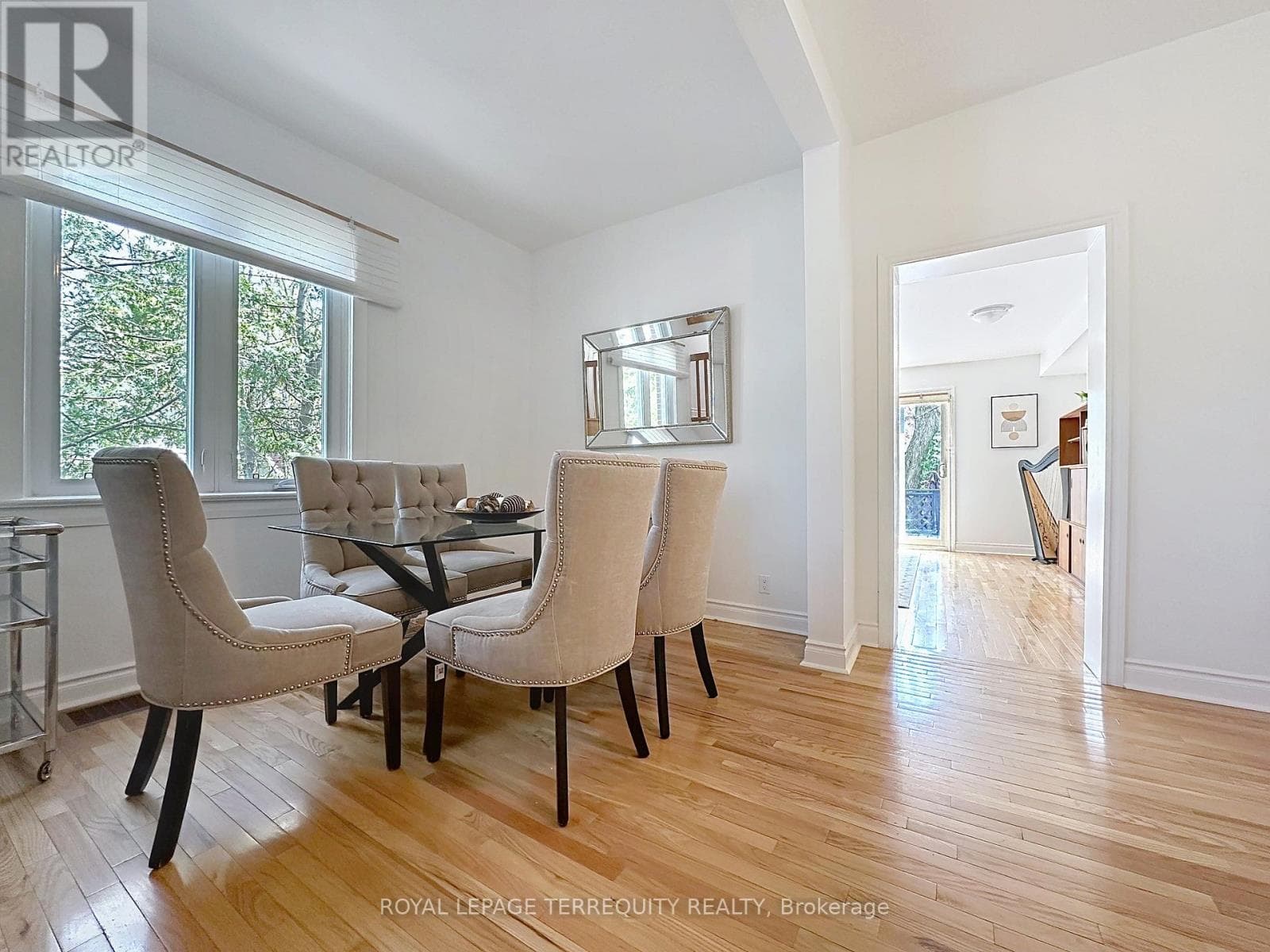 Danforth corner-lot detached with separate-entrance suite potential at $880,000 7