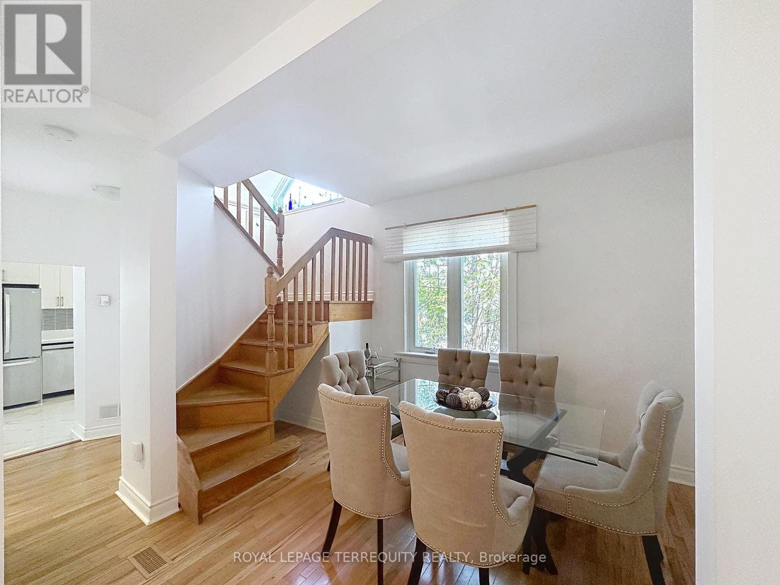 Danforth corner-lot detached with separate-entrance suite potential at $880,000 9