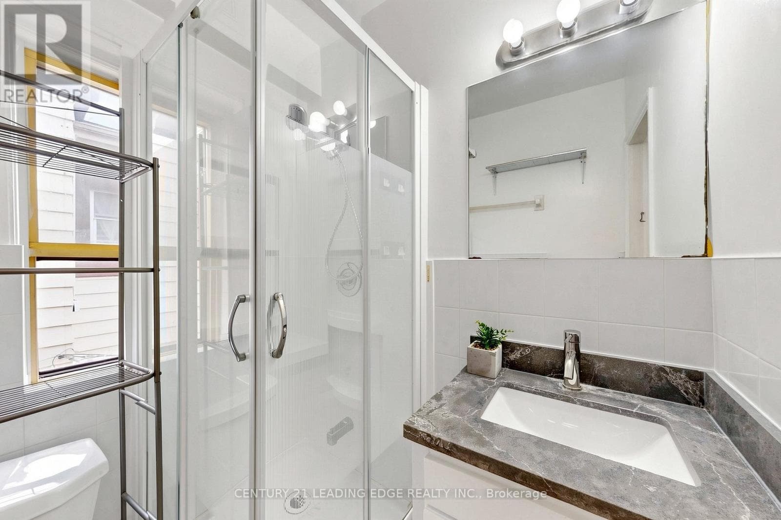 Detached duplex steps from Dufferin Station with garden suite upside on a 120-foot lot 12