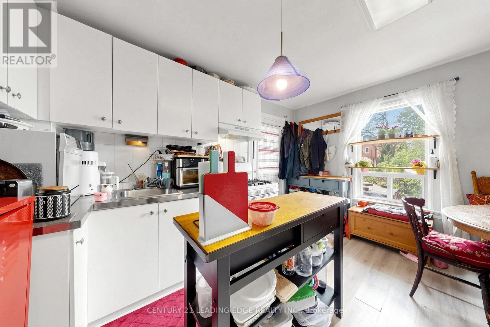 Detached duplex steps from Dufferin Station with garden suite upside on a 120-foot lot 20