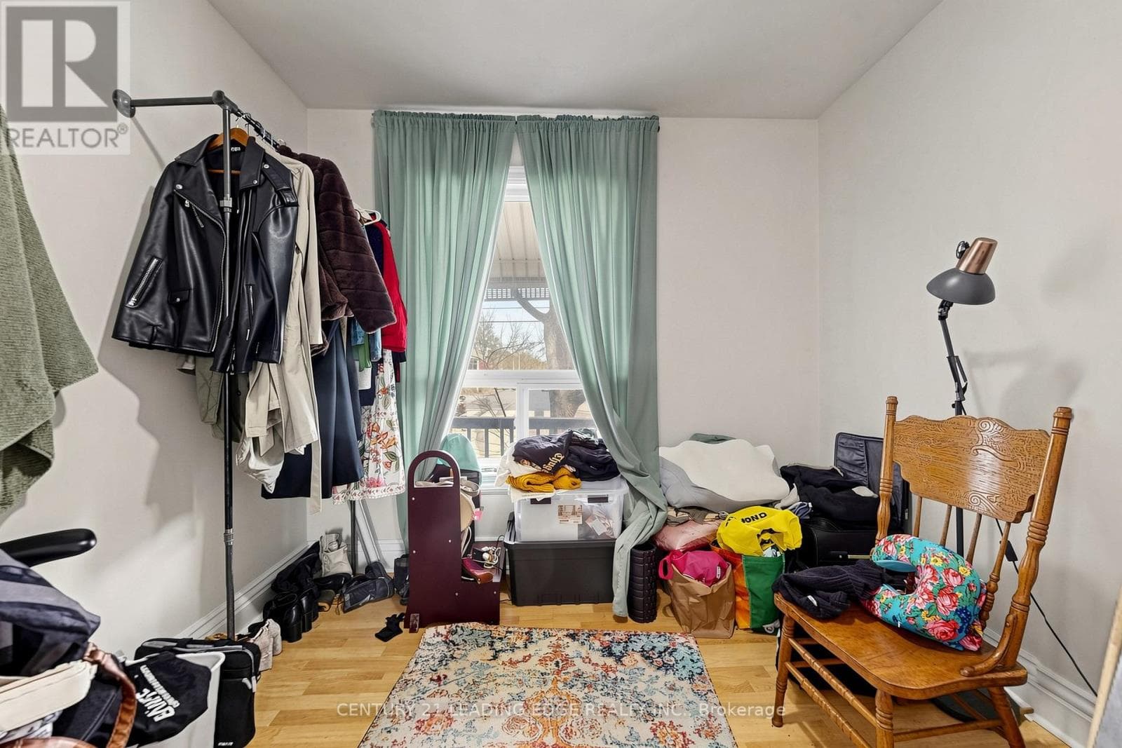 Detached duplex steps from Dufferin Station with garden suite upside on a 120-foot lot 25