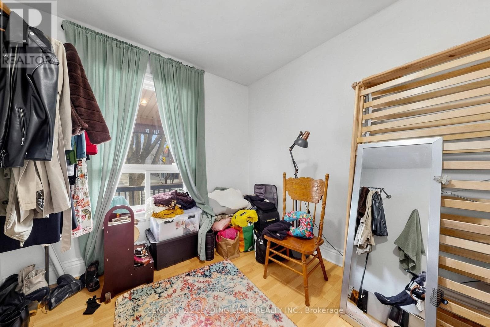 Detached duplex steps from Dufferin Station with garden suite upside on a 120-foot lot 26