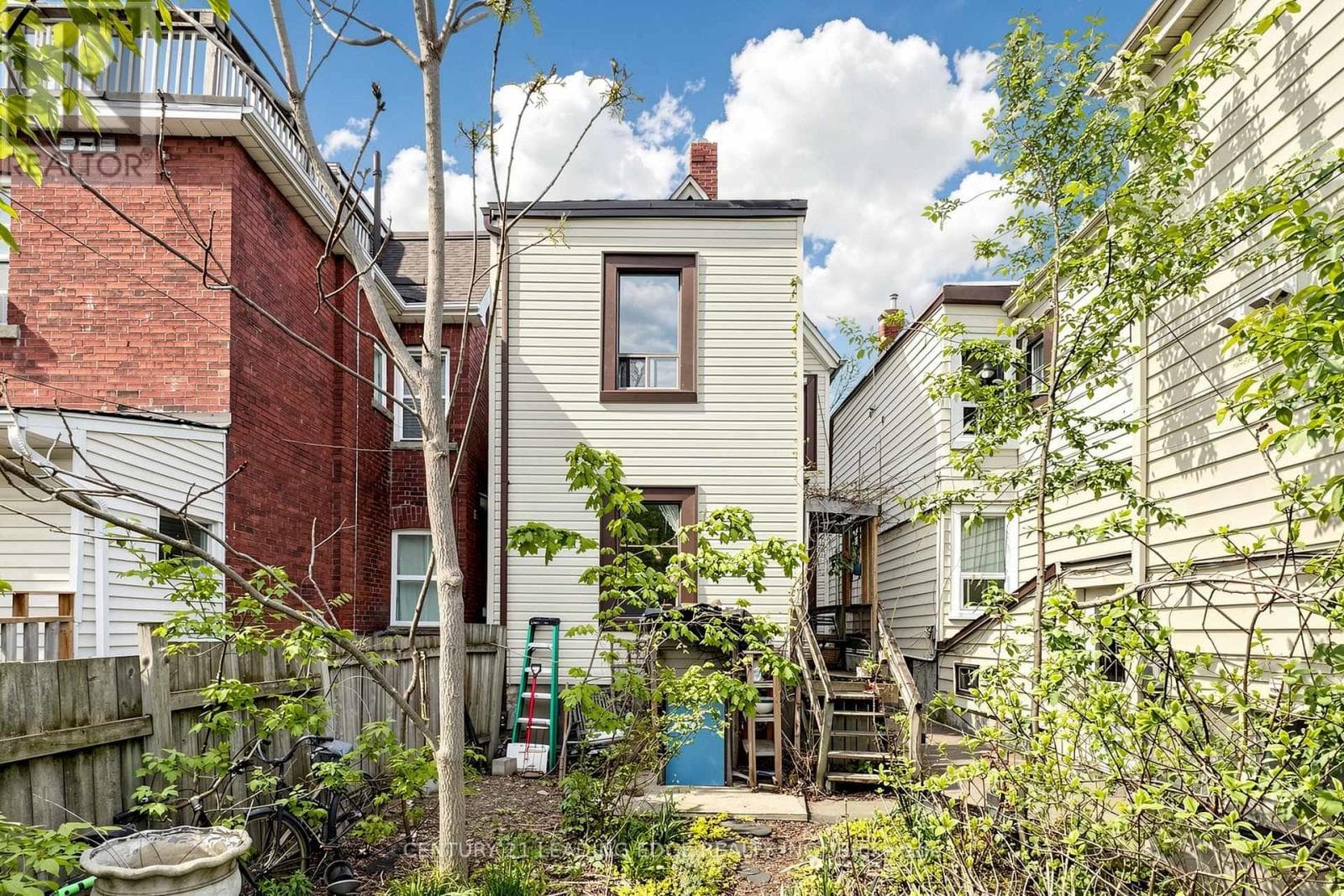 Detached duplex steps from Dufferin Station with garden suite upside on a 120-foot lot 31