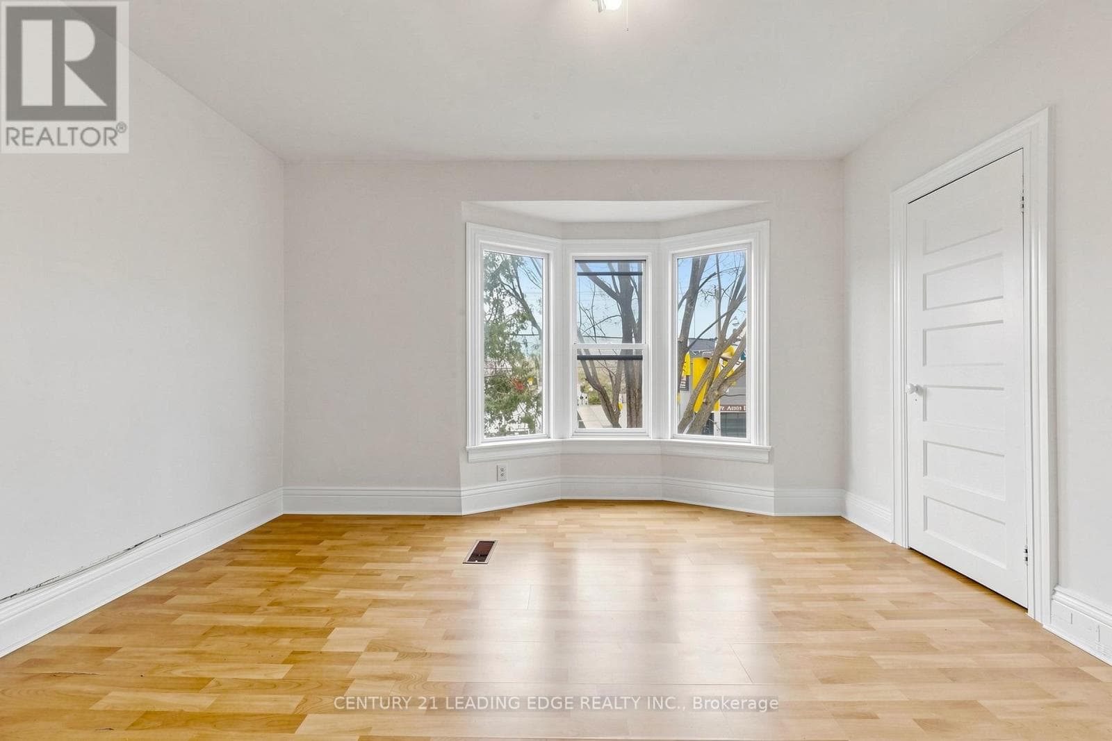 Detached duplex steps from Dufferin Station with garden suite upside on a 120-foot lot 4