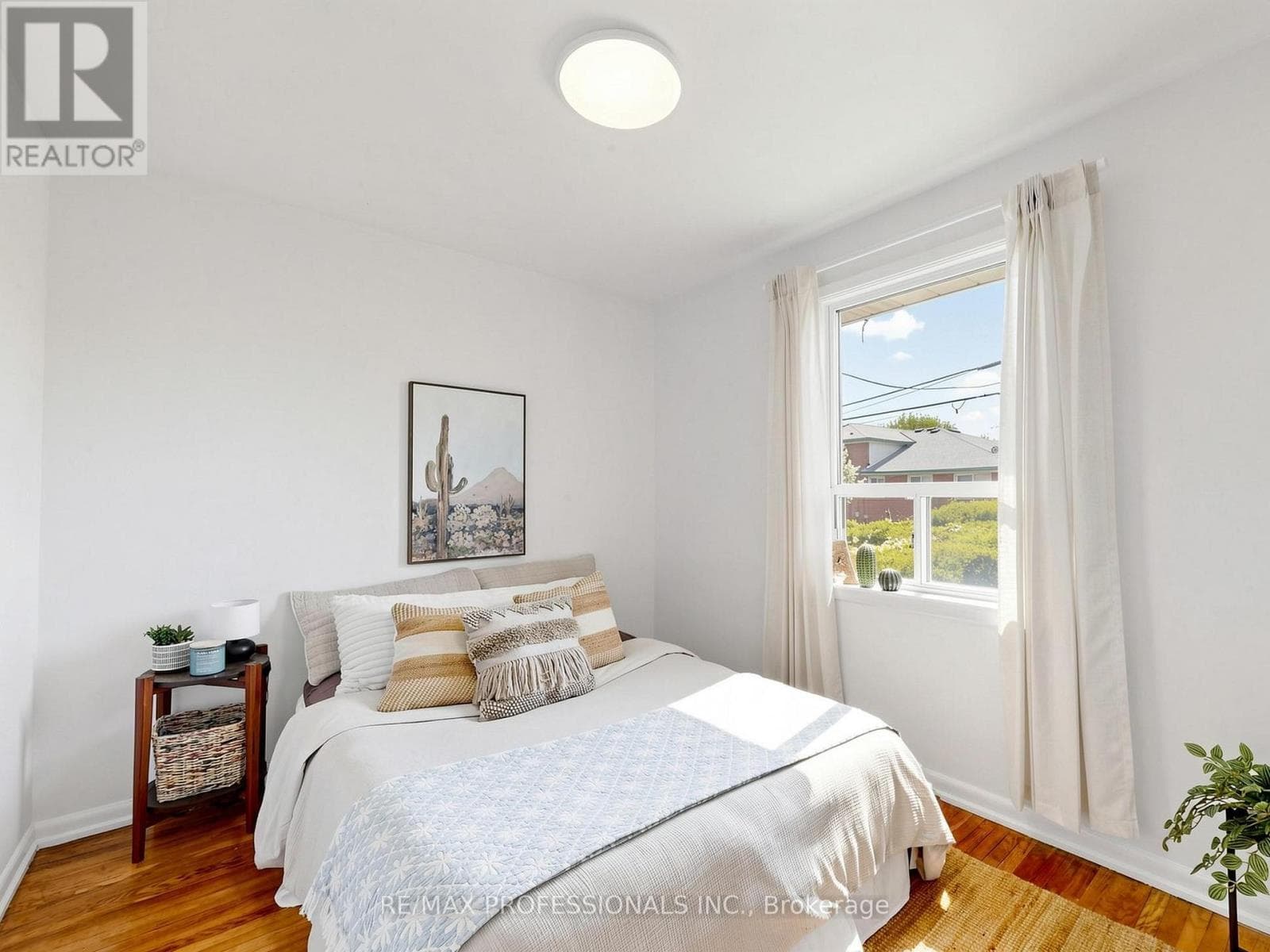 Rexdale brick bungalow with side-entrance basement suite potential, steps to GO transit 15