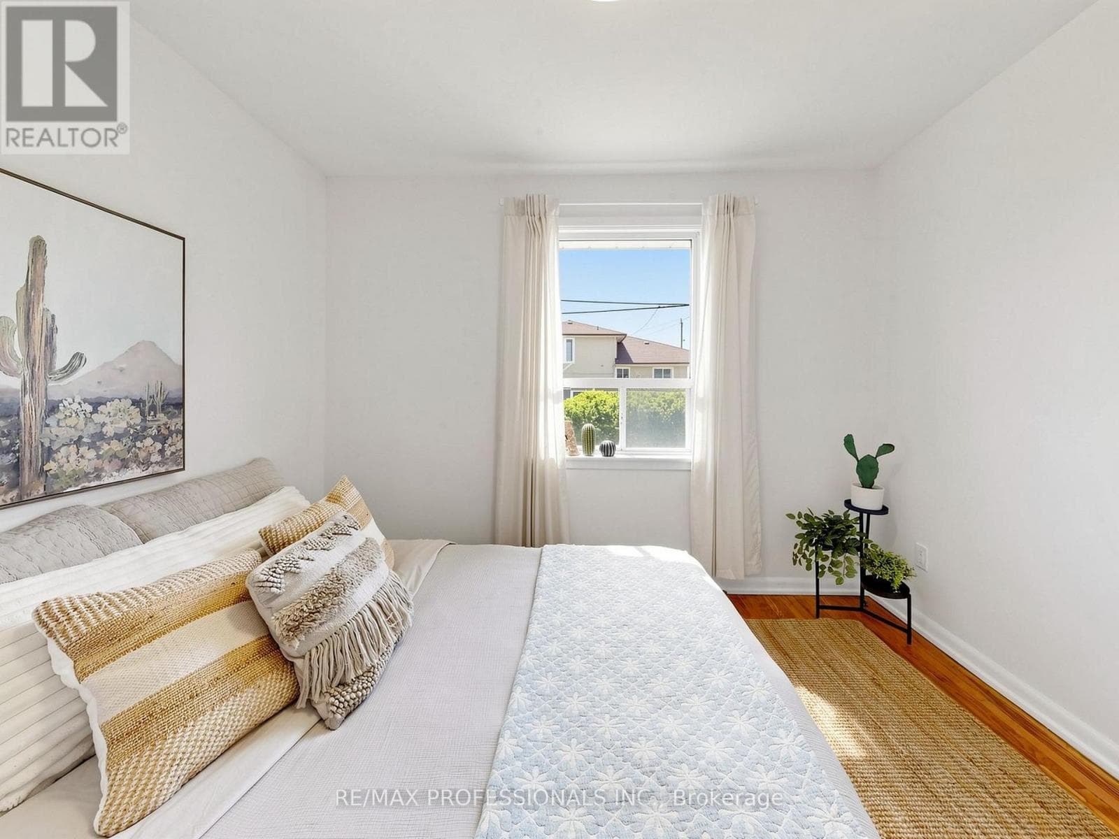 Rexdale brick bungalow with side-entrance basement suite potential, steps to GO transit 16