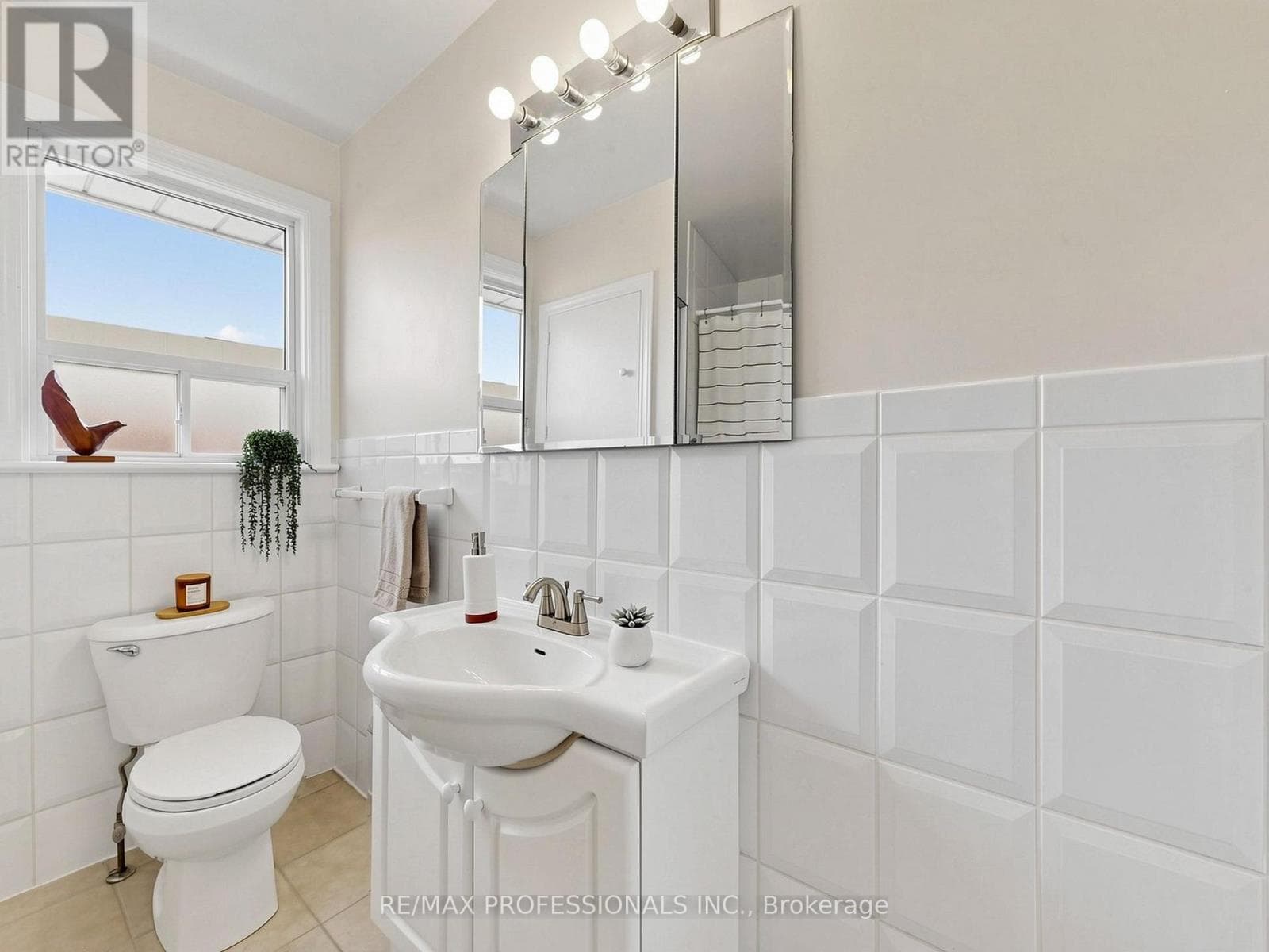Rexdale brick bungalow with side-entrance basement suite potential, steps to GO transit 18