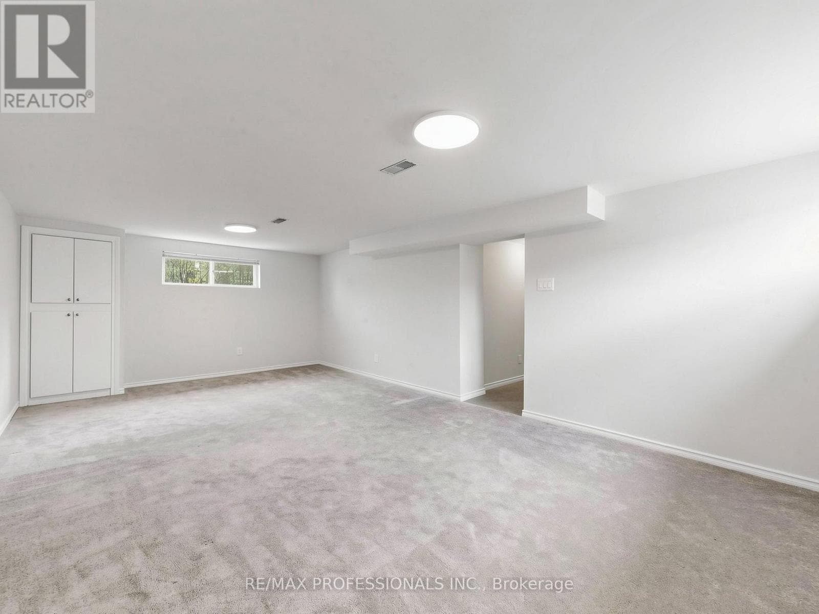 Rexdale brick bungalow with side-entrance basement suite potential, steps to GO transit 25