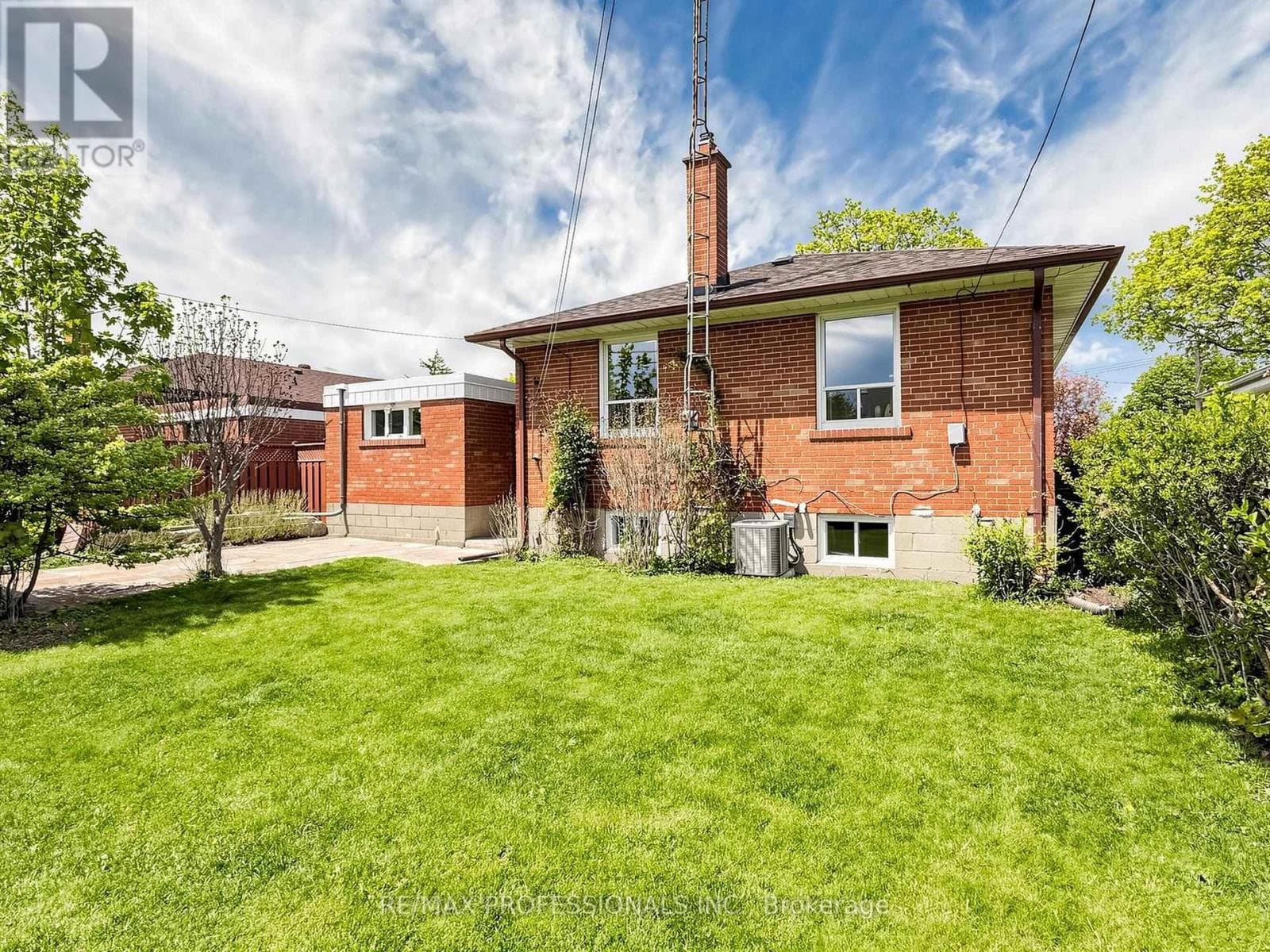 Rexdale brick bungalow with side-entrance basement suite potential, steps to GO transit 26