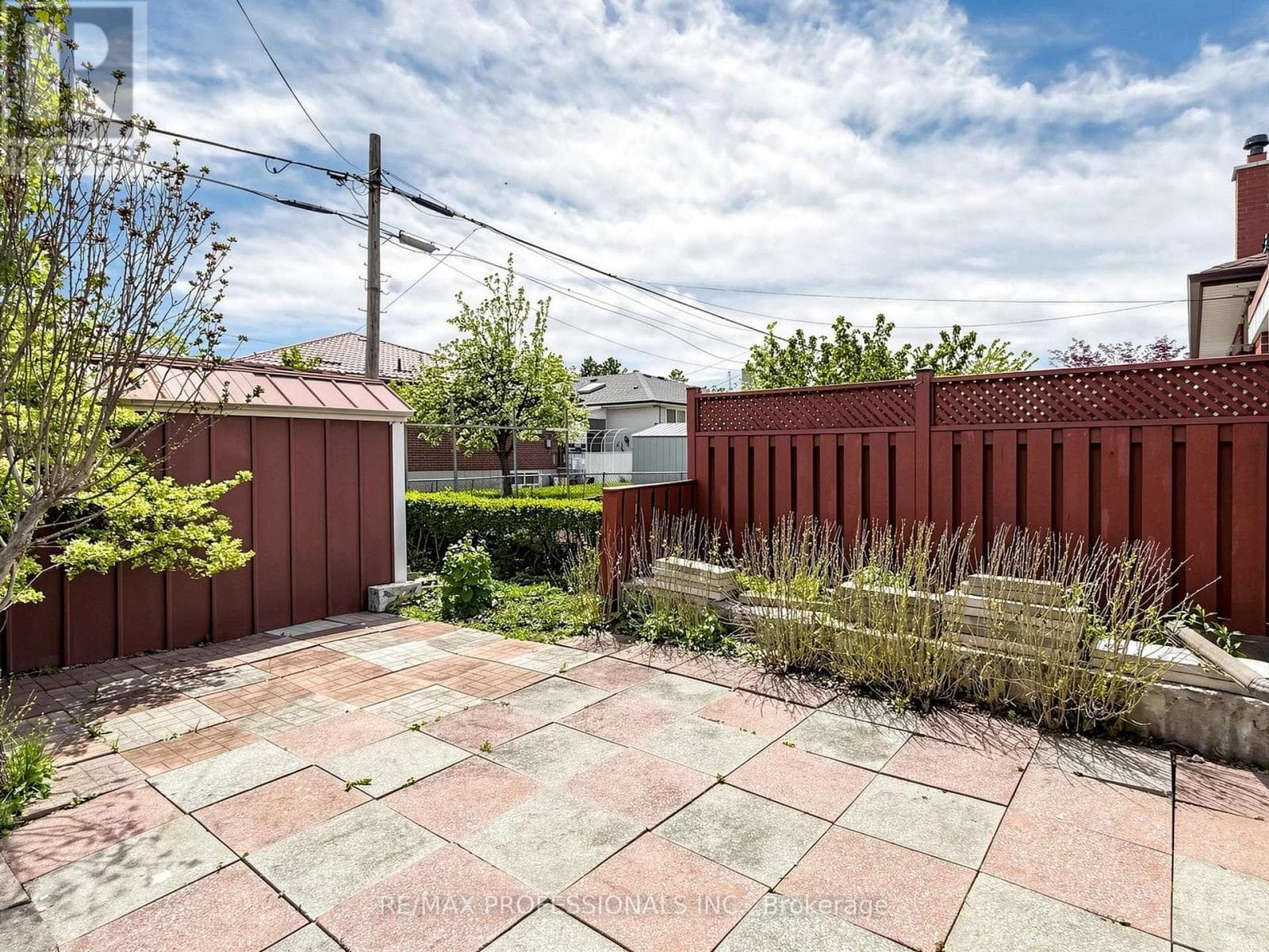 Rexdale brick bungalow with side-entrance basement suite potential, steps to GO transit 27