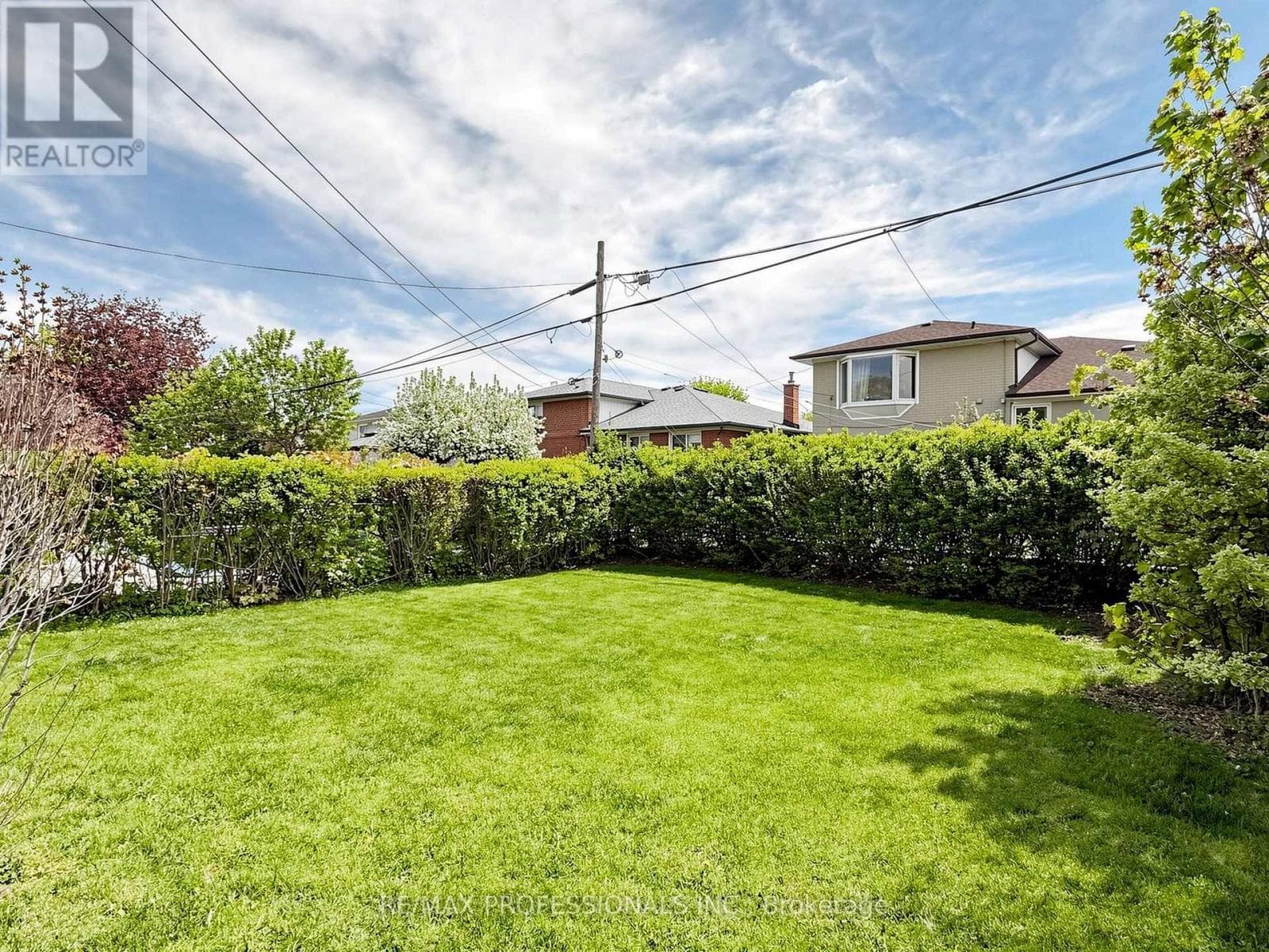 Rexdale brick bungalow with side-entrance basement suite potential, steps to GO transit 28