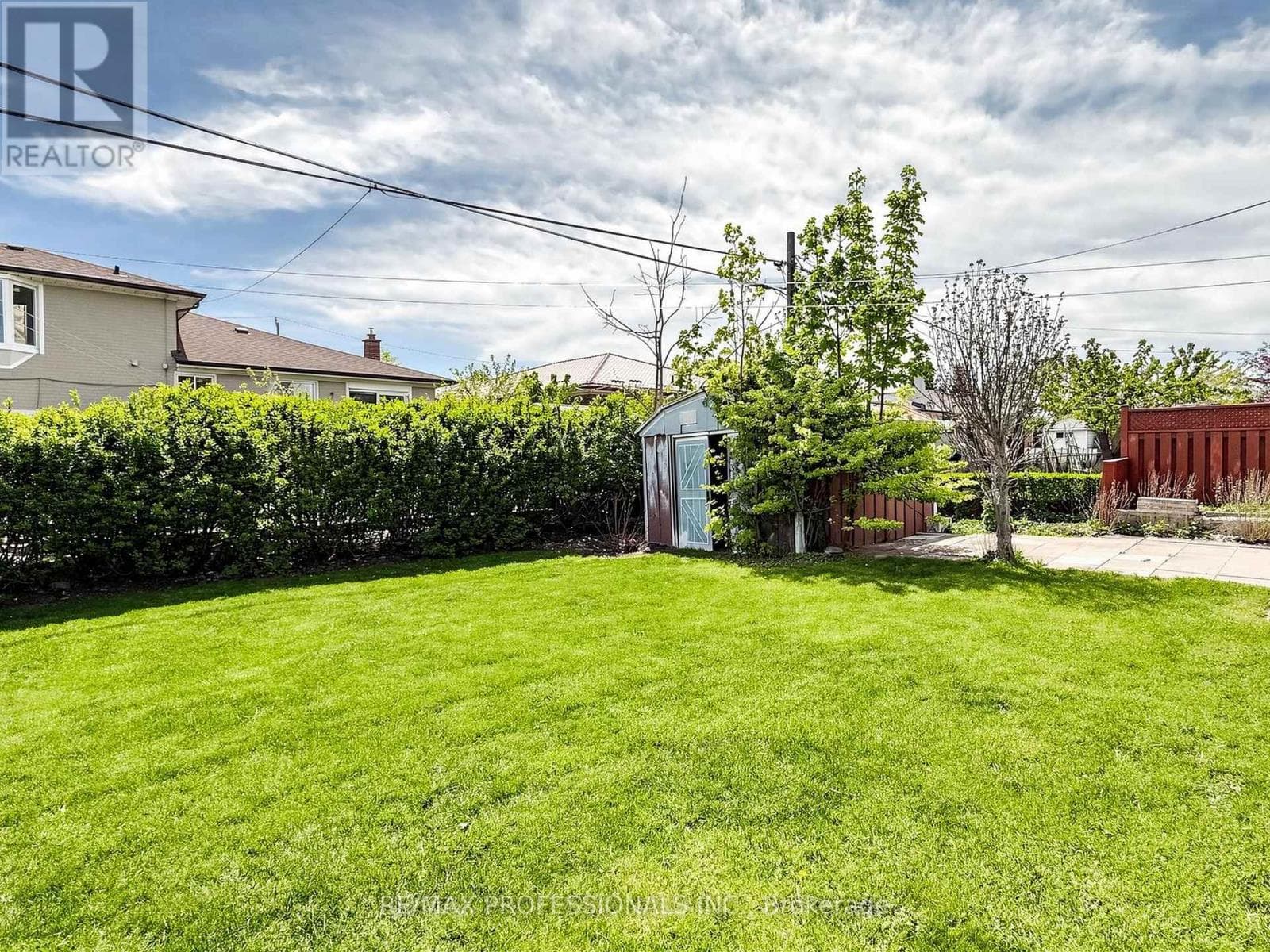 Rexdale brick bungalow with side-entrance basement suite potential, steps to GO transit 29