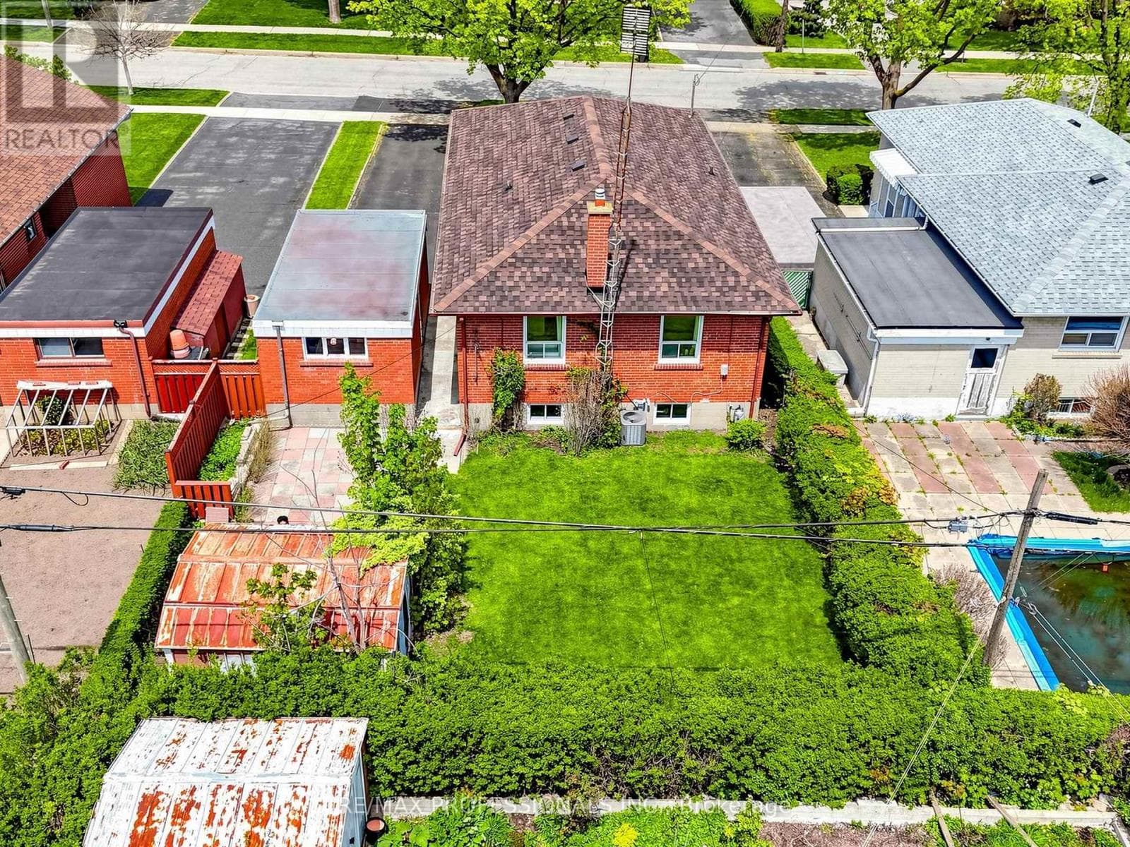 Rexdale brick bungalow with side-entrance basement suite potential, steps to GO transit 30