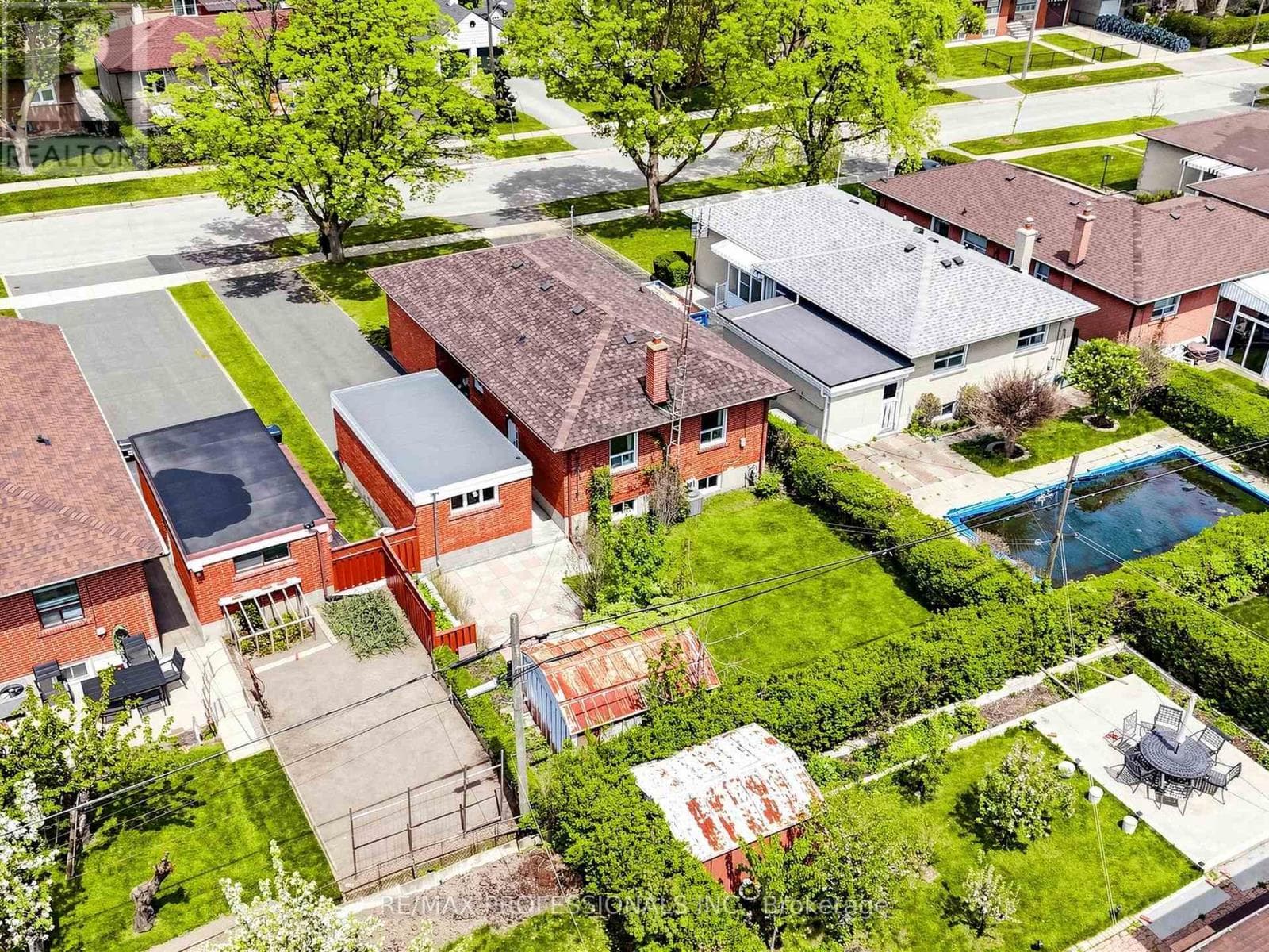 Rexdale brick bungalow with side-entrance basement suite potential, steps to GO transit 31