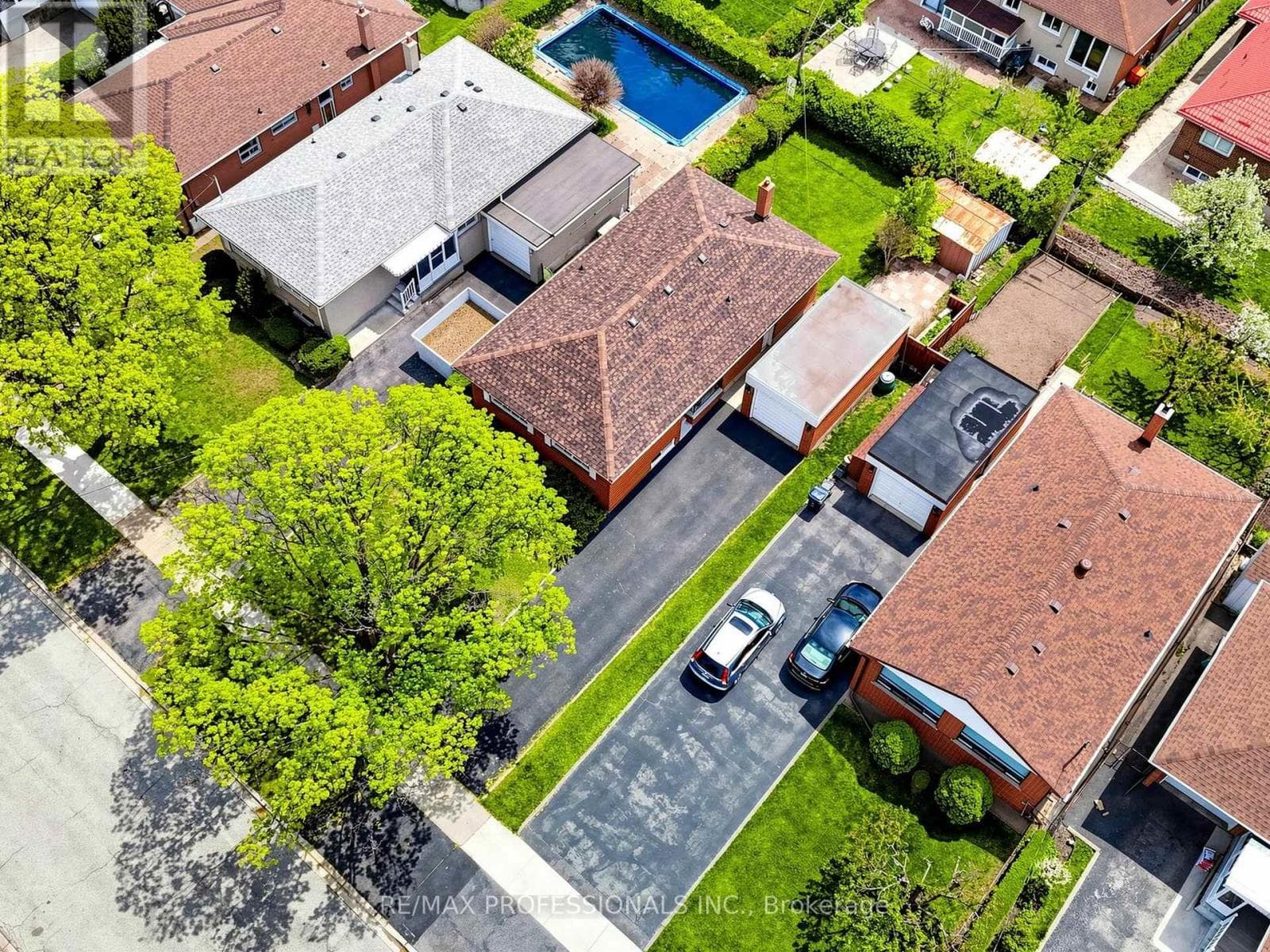 Rexdale brick bungalow with side-entrance basement suite potential, steps to GO transit 32