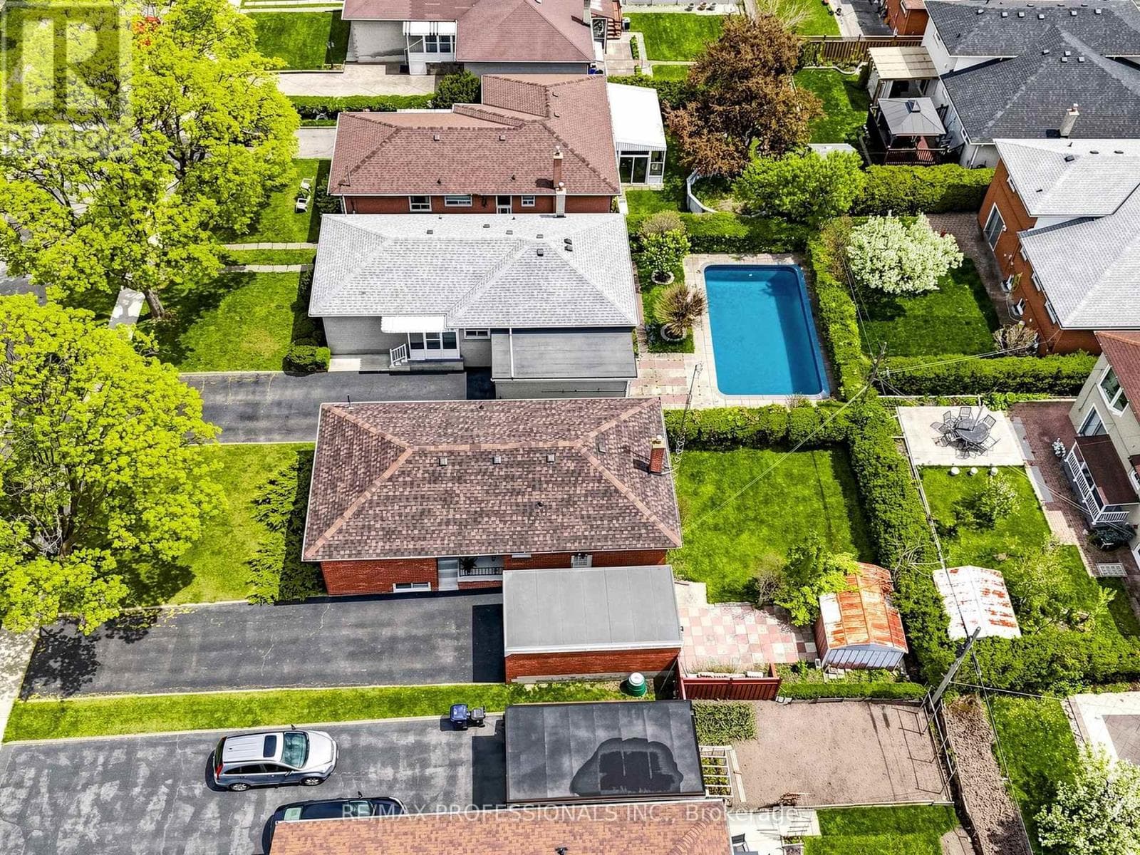 Rexdale brick bungalow with side-entrance basement suite potential, steps to GO transit 33