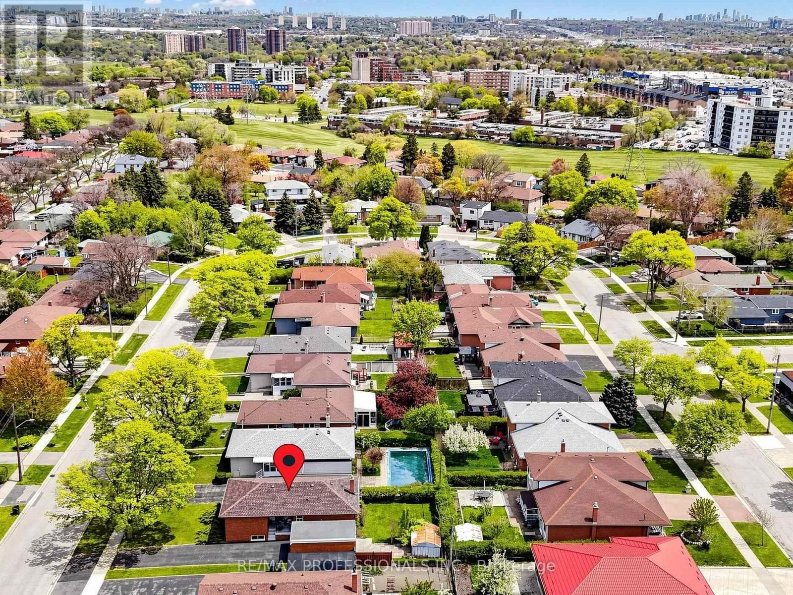 Rexdale brick bungalow with side-entrance basement suite potential, steps to GO transit 34