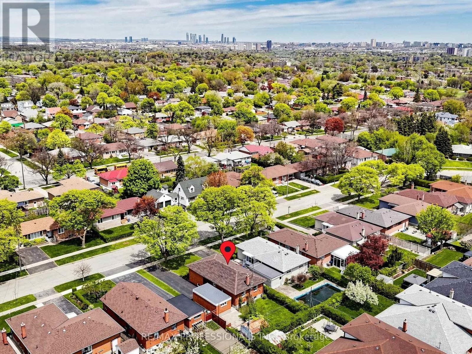 Rexdale brick bungalow with side-entrance basement suite potential, steps to GO transit 35